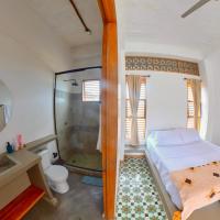 Casa Mambo Salinas客房内的一张或多张床位
