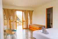 Casa Mambo Salinas客房内的一张或多张床位