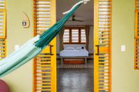 Casa Mambo Salinas客房内的一张或多张床位
