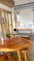 Casa Mambo Salinas客房内的一张或多张床位