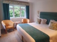 Best Western Moores Central Hotel客房内的一张或多张床位
