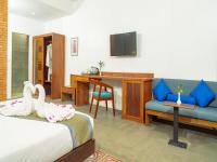Tanei Angkor Resort and Spa客房内的一张或多张床位