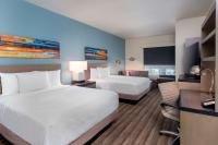 Hyatt House Orlando Airport客房内的一张或多张床位