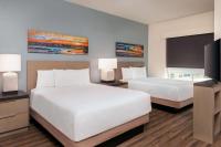 Hyatt House Orlando Airport客房内的一张或多张床位