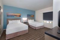 Hyatt House Orlando Airport客房内的一张或多张床位