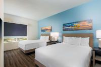 Hyatt House Orlando Airport客房内的一张或多张床位