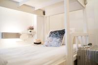 Qilombo Hostel Silom - HQ客房内的一张或多张床位