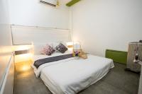 Qilombo Hostel Silom - HQ客房内的一张或多张床位
