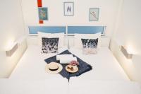 Qilombo Hostel Silom - HQ客房内的一张或多张床位