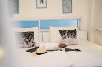 Qilombo Hostel Silom - HQ客房内的一张或多张床位