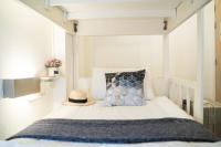Qilombo Hostel Silom - HQ客房内的一张或多张床位