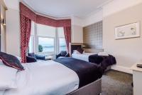 Lauriston &amp; Lawton Court Hotel客房内的一张或多张床位