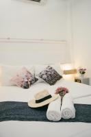 Qilombo Hostel Silom - HQ客房内的一张或多张床位