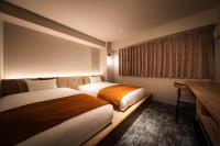 R Hotel Namba South客房内的一张或多张床位