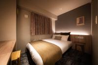 R Hotel Namba South客房内的一张或多张床位