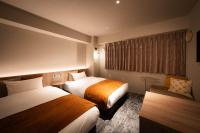 R Hotel Namba South客房内的一张或多张床位