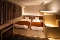 R Hotel Namba South客房内的一张或多张床位
