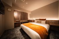 R Hotel Namba South客房内的一张或多张床位