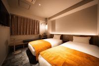 R Hotel Namba South客房内的一张或多张床位