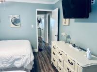 Deeded Beach Access- 10 min Walk to Hangout客房内的一张或多张床位