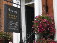 法利Filey Grange Guest House的花房边的标志