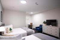 Main Street Motel客房内的一张或多张床位