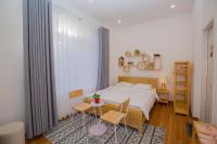 Suri Homestay客房内的一张或多张床位