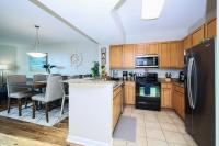 Marvelous 9th Floor Condo Gulf, Pool &amp; Sunset View的厨房或小厨房