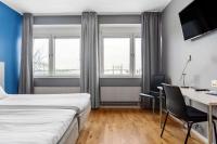 Sure Hotel by Best Western Stockholm Alvsjo客房内的一张或多张床位
