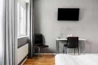 Sure Hotel by Best Western Stockholm Alvsjo的电视和/或娱乐中心