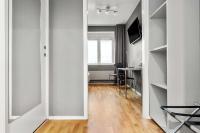 Sure Hotel by Best Western Stockholm Alvsjo的电视和/或娱乐中心