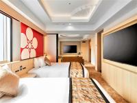 Daiwa Roynet Hotel KANAZAWA-MIYABI的电视和/或娱乐中心