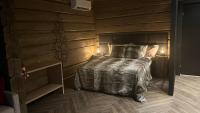 Invisible Forest Lodge客房内的一张或多张床位