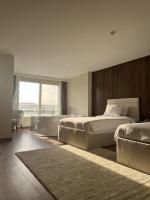 The Home Boutique Hotel Pyramids Inn客房内的一张或多张床位