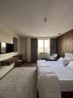 The Home Boutique Hotel Pyramids Inn客房内的一张或多张床位
