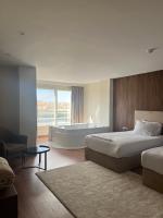 The Home Boutique Hotel Pyramids Inn客房内的一张或多张床位