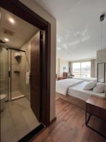 The Home Boutique Hotel Pyramids Inn客房内的一张或多张床位