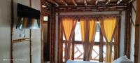 Villa Ester Hostel Vereda Cay的电视和/或娱乐中心
