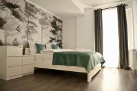Mathias Airport Residences & Therme-Self Check-in客房内的一张或多张床位