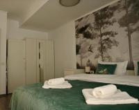 Mathias Airport Residences & Therme-Self Check-in客房内的一张或多张床位