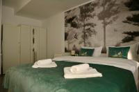 Mathias Airport Residences & Therme-Self Check-in客房内的一张或多张床位