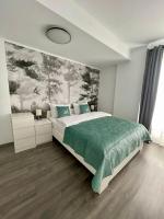Mathias Airport Residences & Therme-Self Check-in客房内的一张或多张床位