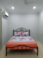 Cempaka Homestay Batu Pahat 93客房内的一张或多张床位