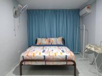 Cempaka Homestay Batu Pahat 93客房内的一张或多张床位