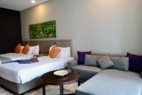 Qliq Damansara Hotel客房内的一张或多张床位