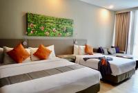 Qliq Damansara Hotel客房内的一张或多张床位