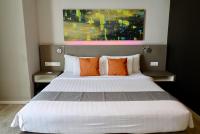 Qliq Damansara Hotel客房内的一张或多张床位