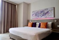 Qliq Damansara Hotel客房内的一张或多张床位