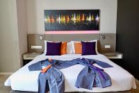 Qliq Damansara Hotel客房内的一张或多张床位