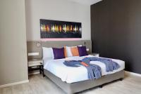 Qliq Damansara Hotel客房内的一张或多张床位